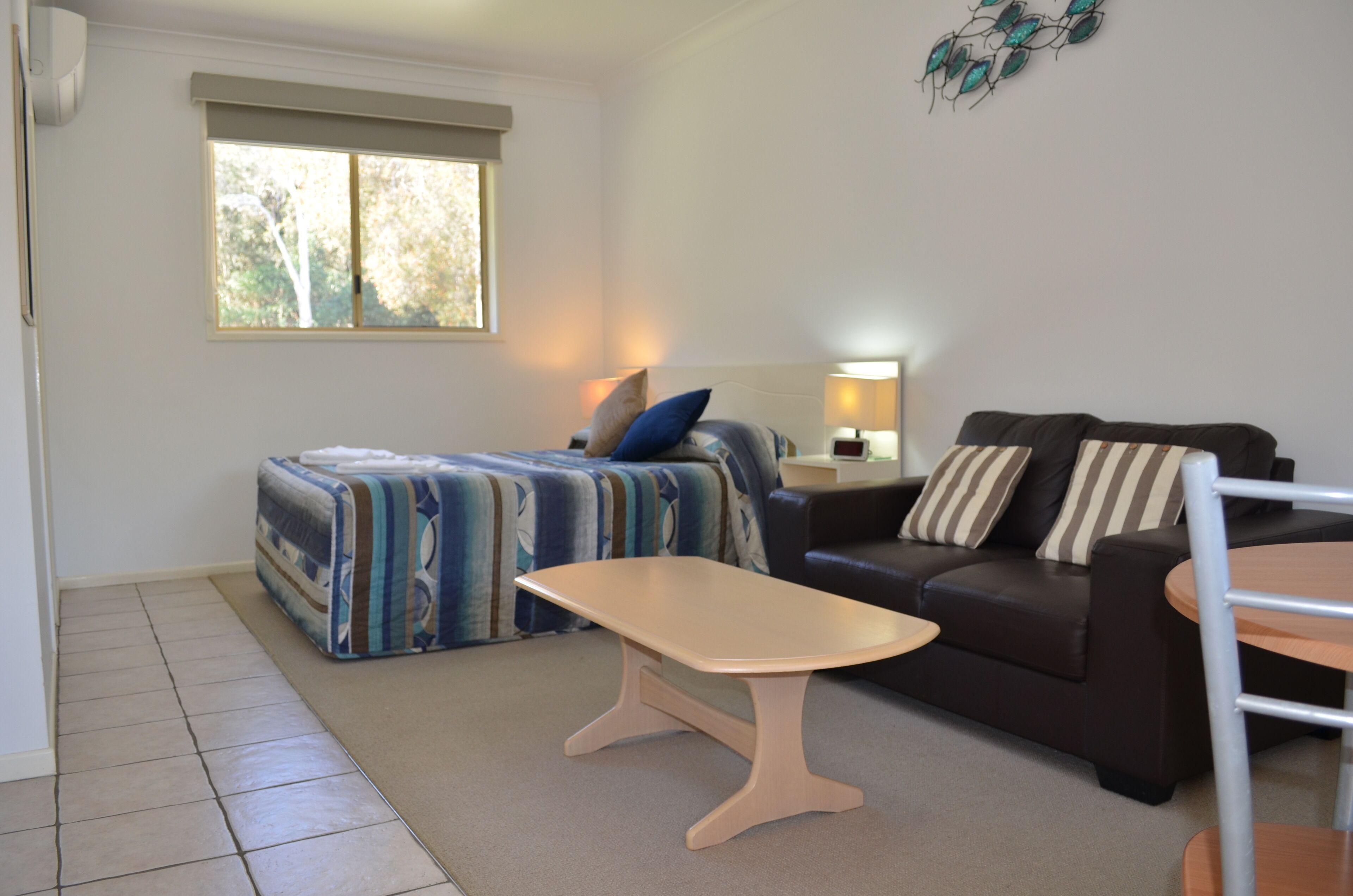 deluxe queen room  | blackout curtains, cots/infant beds, free wifi, bed sheets