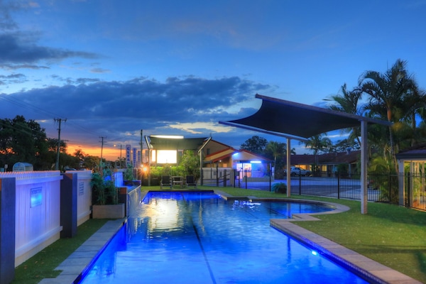 Outdoor pool, open 8:00 AM to 9:00 PM, pool loungers