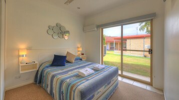 Deluxe Family Two Room Unit | Blackout drapes, cribs/infant beds, free WiFi, bed sheets