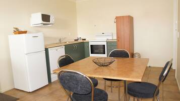 2 Bedroom Unit | Private kitchen | Fridge, microwave, coffee/tea maker, cookware/dishes/utensils