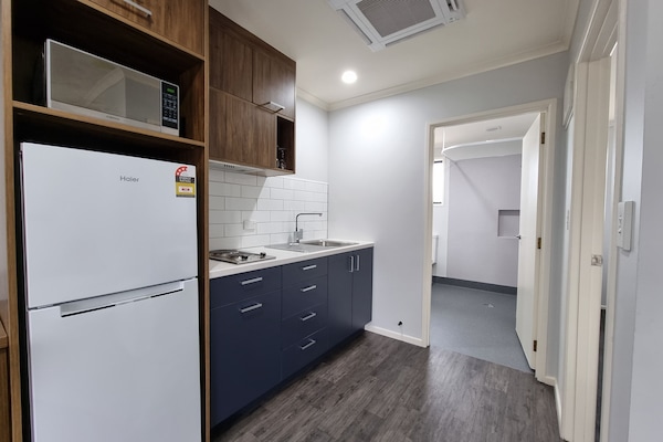 Family Apartment, 1 Bedroom (Disability Access) | Private kitchen | Fridge, microwave, coffee/tea maker, electric kettle