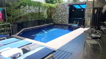 Outdoor pool, pool loungers
