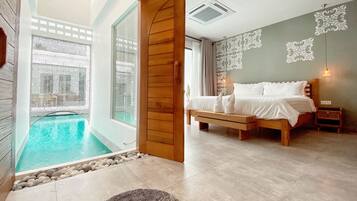 Svit - tillgång till pool | Gratis produkter i minibar och värdeförvaringsskåp på rummet