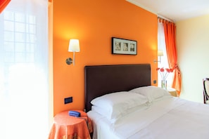 Premium bedding, down comforters, memory foam beds, minibar