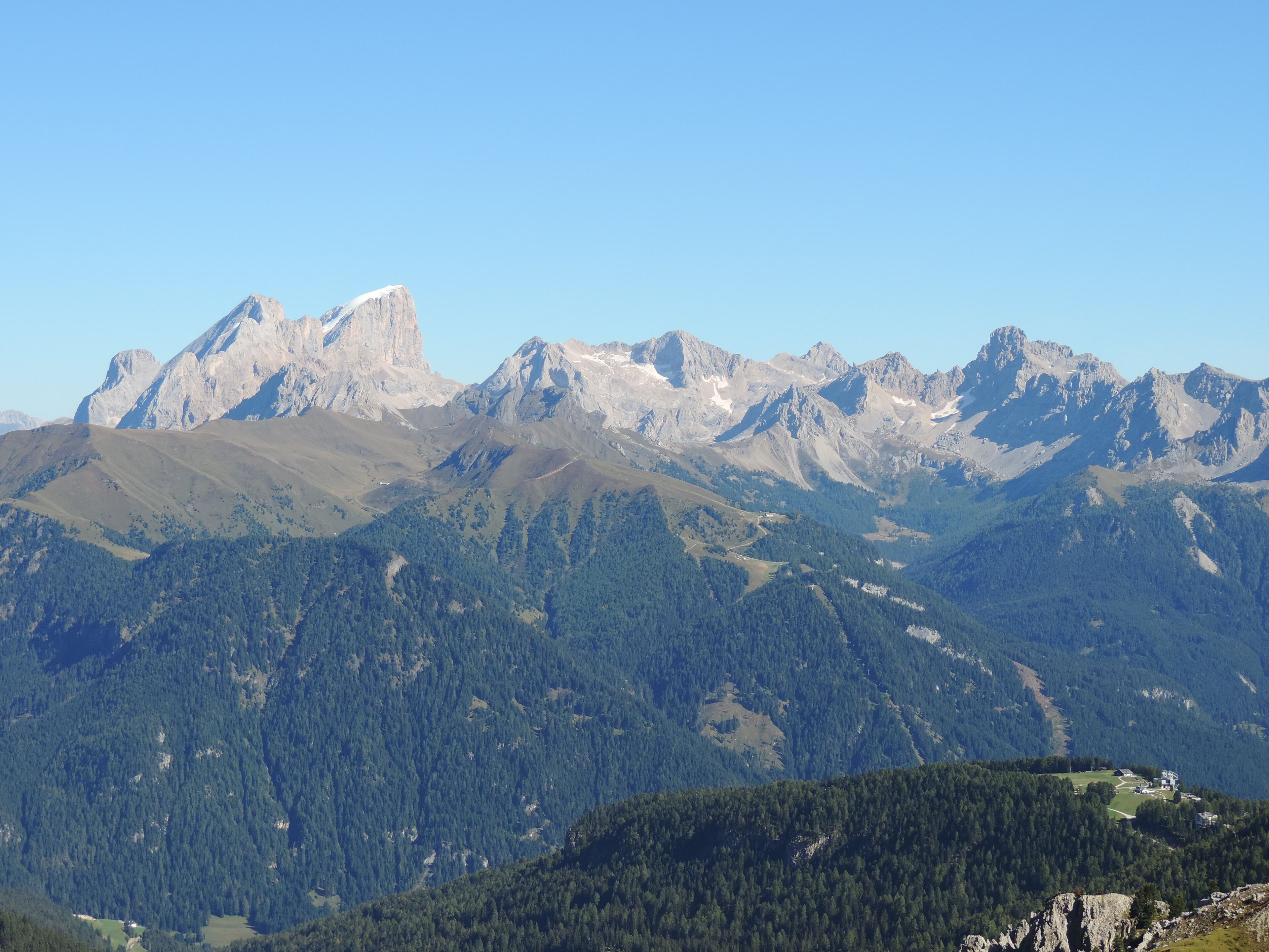 A mountainous landscape with a clear sky.