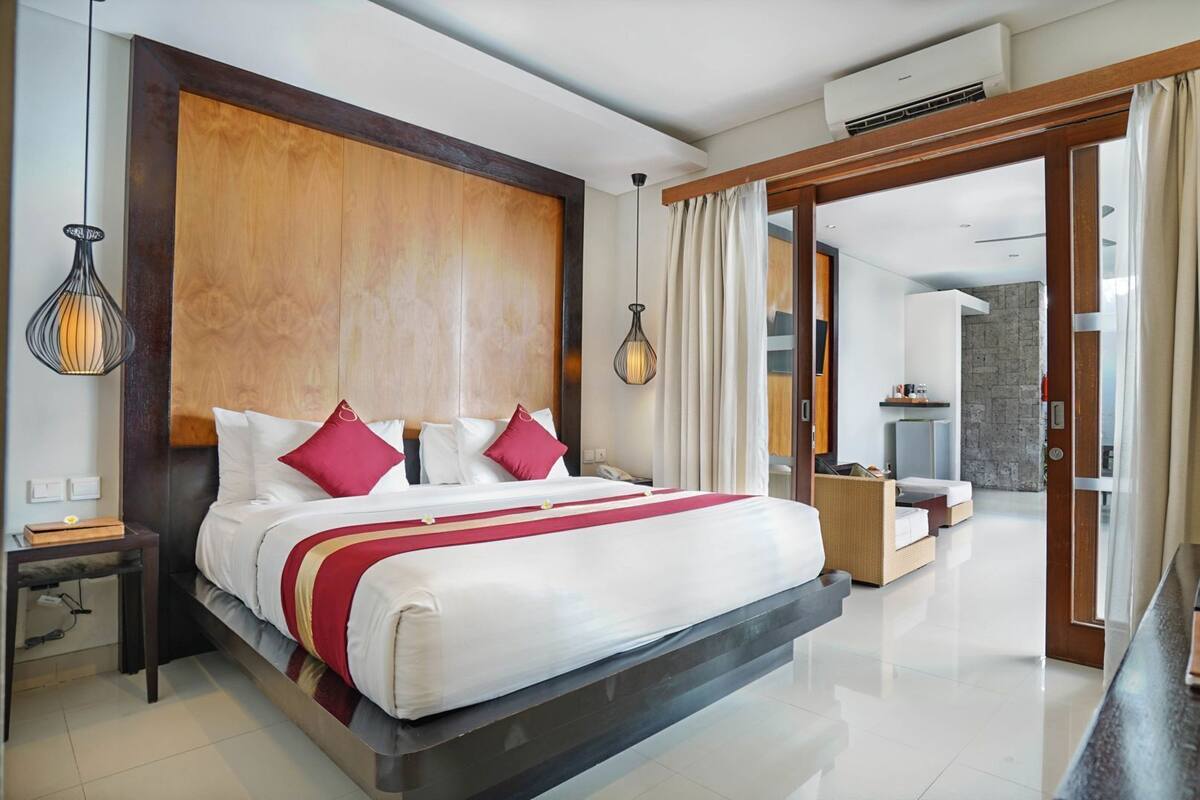 1 makuuhuone, ylelliset vuodevaatteet, minibaari, tallelokero huoneessa