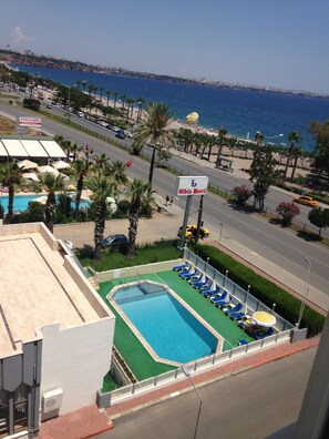 Seasonal outdoor pool, open 8:30 AM to 8:00 PM, free pool cabanas