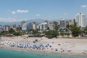Beach nearby, white sand, beach cabanas, sun-loungers