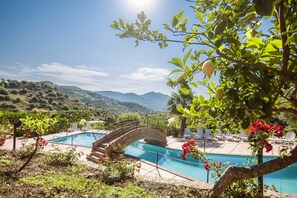 Seasonal outdoor pool, open 9:00 AM to 7:00 PM, sun loungers