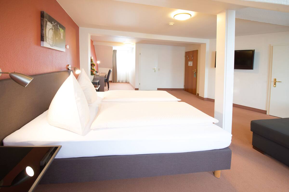Junior Suite, Non Smoking (Breakfast Excluded) | Hypo-allergenic bedding available, in-room safe, desk, blackout drapes