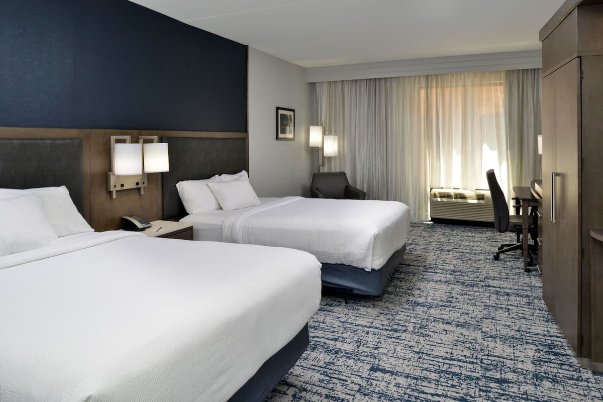 Room, 2 Queen Beds, Non Smoking | Desk, laptop workspace, blackout drapes, iron/ironing board