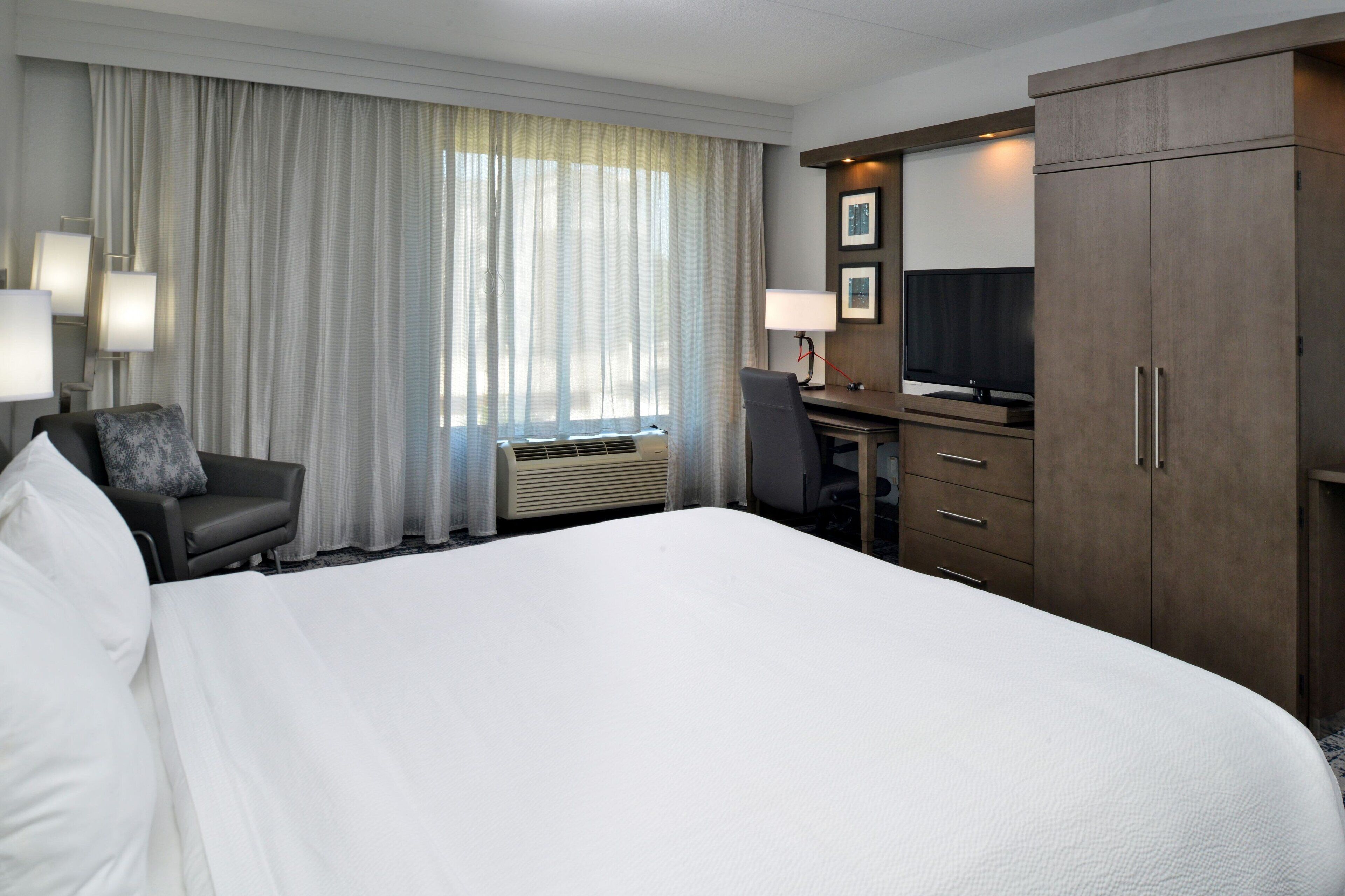 room, 1 king bed | desk, laptop workspace, blackout curtains, iron/ironing board