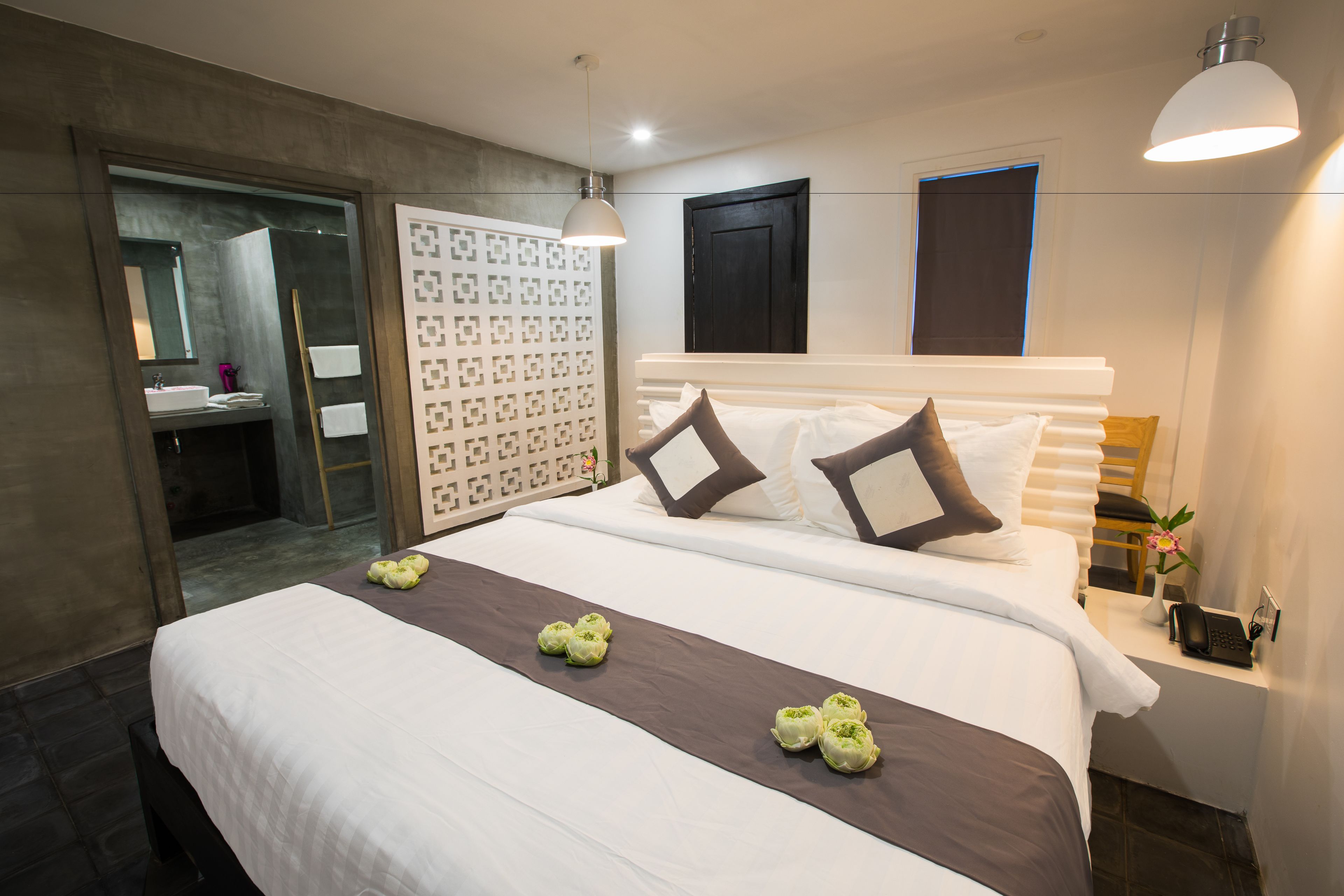 king bed deluxe room - free round trip transfer | premium bedding, in-room safe, individually decorated