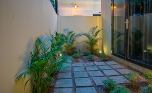 Chambre Deluxe avec lits jumeaux (with Private Garden) | Terrasse/Patio