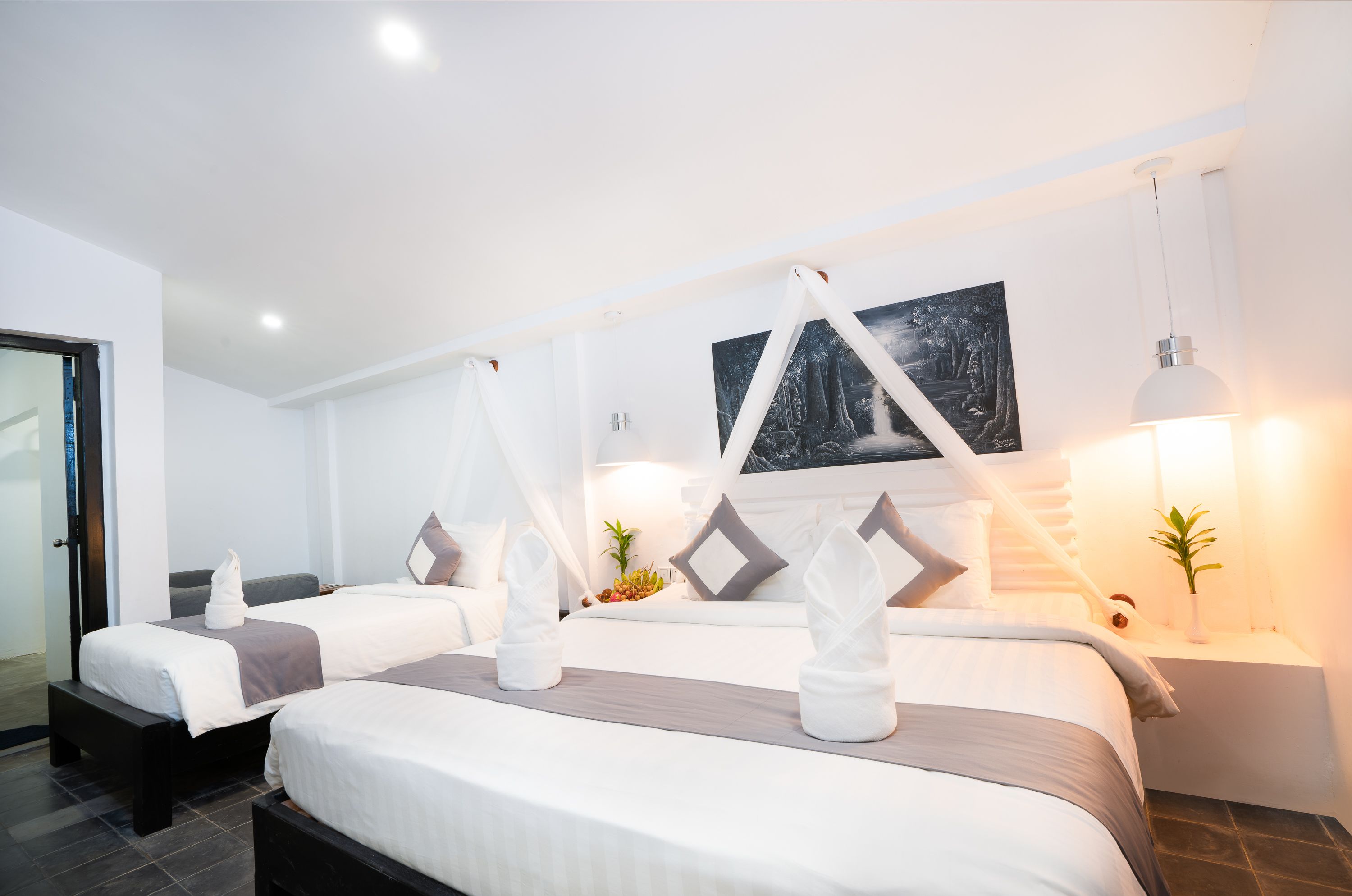 deluxe family (1 king bed and 1 single bed) - free round trip transfer | premium bedding, in-room safe, individually decorated