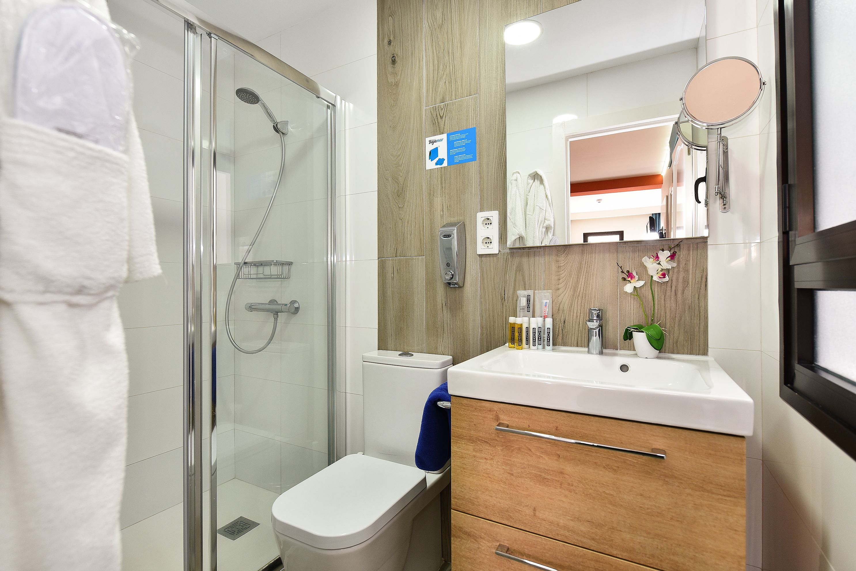 studio suite | bathroom | shower, designer toiletries, hair dryer, slippers
