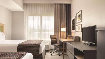 Pillowtop beds, desk, laptop workspace, blackout drapes