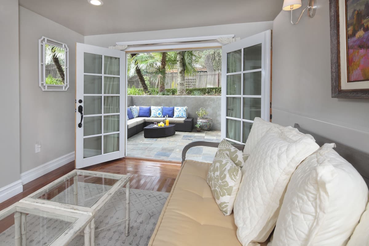 Suite, 1 King Bed | Living area | TV