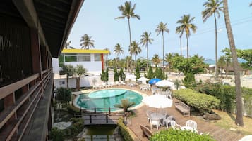 Outdoor pool, open 11 AM to 8 PM, pool loungers