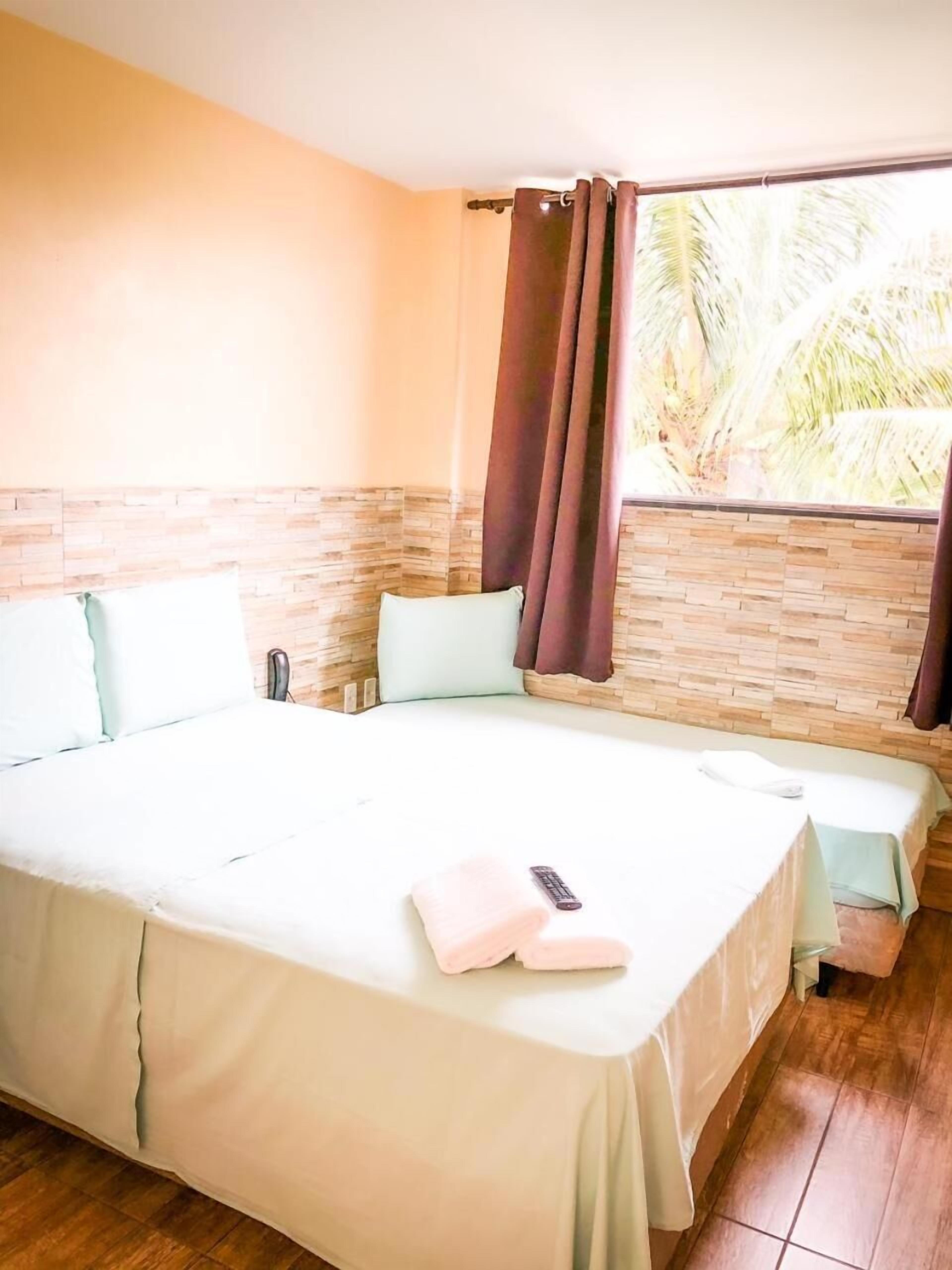 ミニバー、遮光カーテン、WiFi (無料)、ベッドシーツ