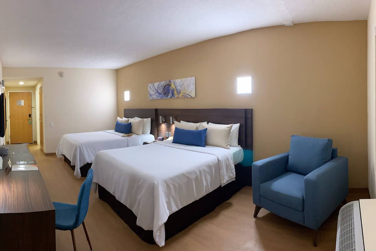 standard quadruple room, 2 queen beds | in-room safe, desk, soundproofing, iron/ironing board