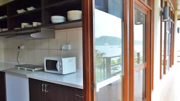 Grand Suite, Ocean View | Private kitchen | Coffee/tea maker, electric kettle