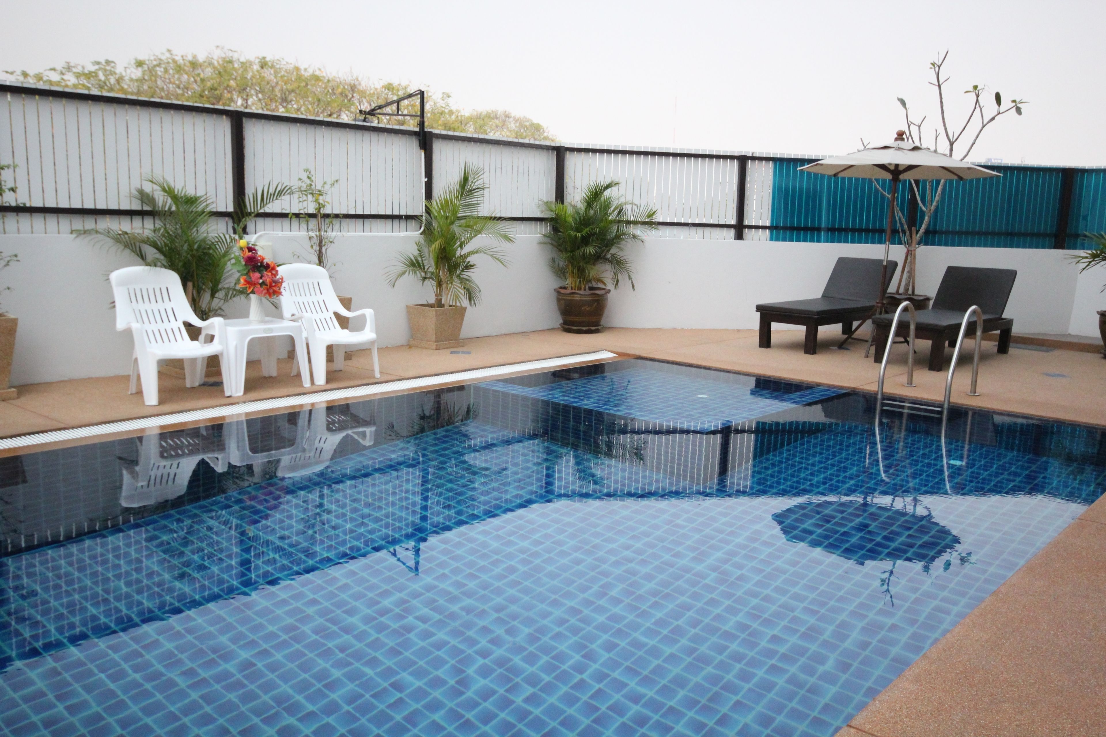 outdoor pool, pool loungers