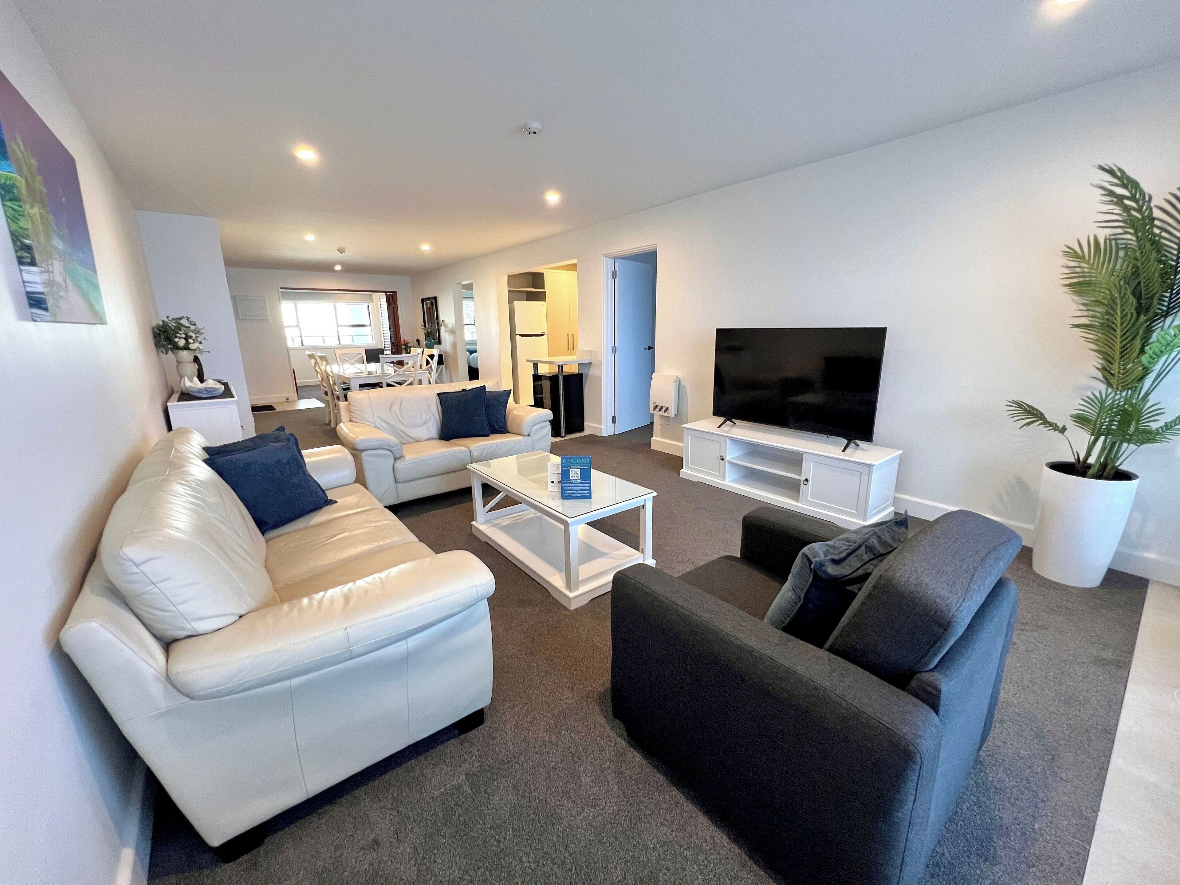 Deluxe Apartment | Living area | 32-inch Smart TV with digital channels