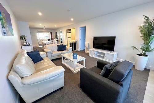 Deluxe Apartment | Living area | 32-inch Smart TV with digital channels