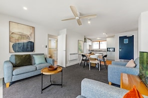 Comfort Apartment | Living area | 32-inch Smart TV with digital channels - 6 on Adams  (Tauranga)