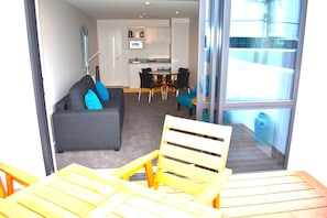 Standard Apartment | Living area | 32-inch Smart TV with digital channels