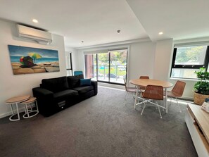 Family Apartment, Bay View | Living area | 32-inch Smart TV with digital channels