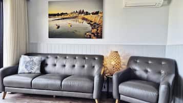 Two Bedroom Apartment - Ocean View | Living area | 40-inch Smart TV with digital channels