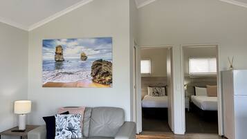 Two Bedroom Apartment - Garden View | Living area | 40-inch Smart TV with digital channels