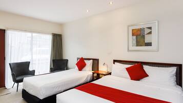 Premium bedding, individually furnished, desk, laptop workspace