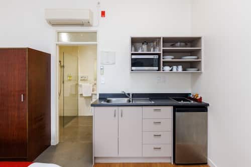 Fridge, microwave, stovetop, coffee/tea maker