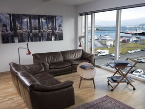 Family Apartment, Harbour View (Myrargata 26) | Living area | Flat-screen TV, DVD player - Reykjavík Central Apartments (Reykjavik)