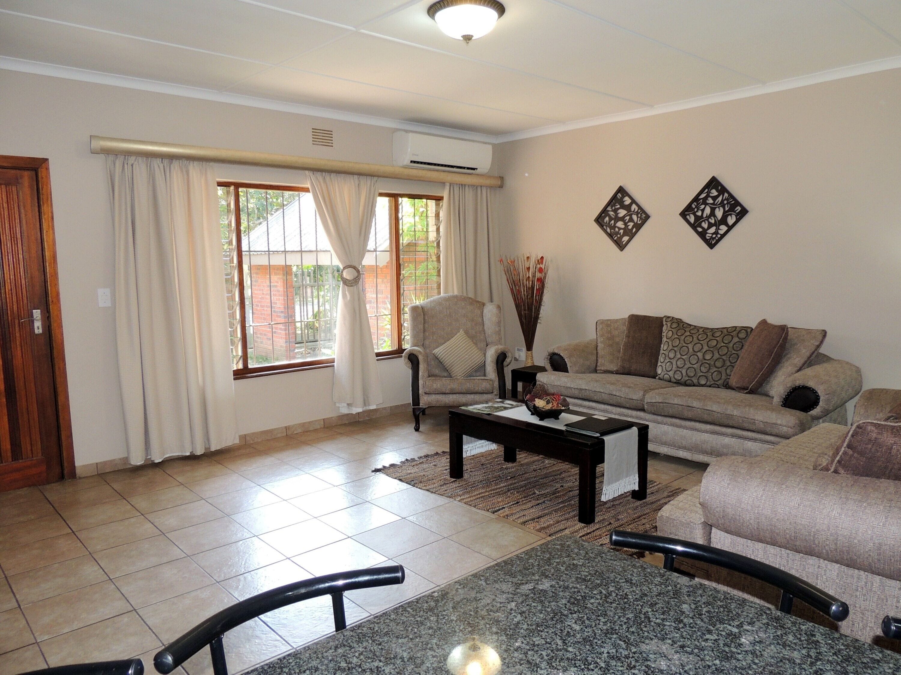Family Apartment, 2 Bedrooms, Garden Area | Living area | LED TV, DVD player