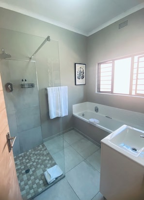 Family Apartment, 2 Bedrooms, Garden Area | Bathroom | Shower, hair dryer, towels, soap