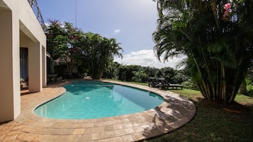 Outdoor pool, pool umbrellas, sun loungers