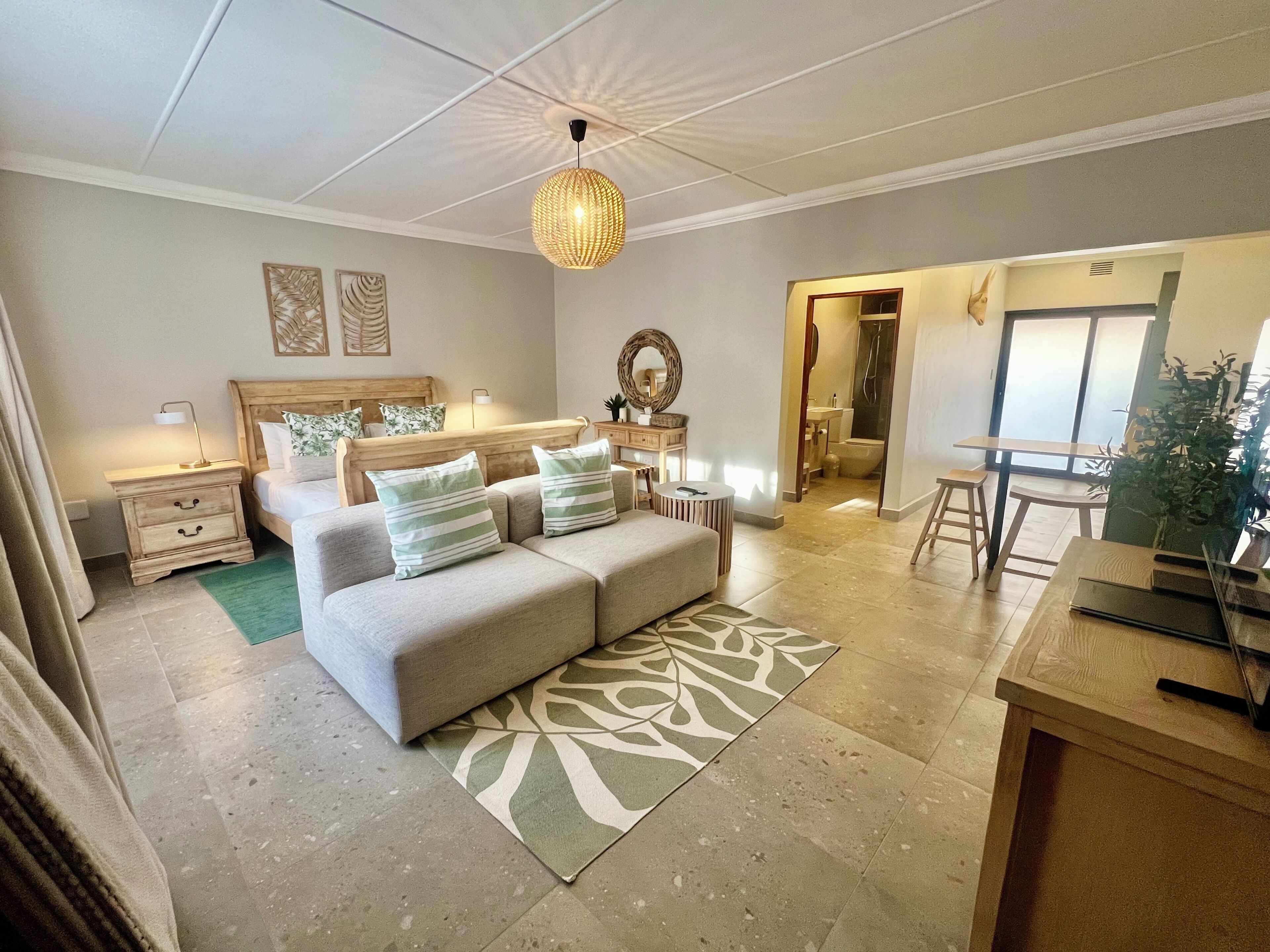 Deluxe Apartment, 1 Bedroom, Garden Area | Living area | 64-inch Smart TV with satellite channels