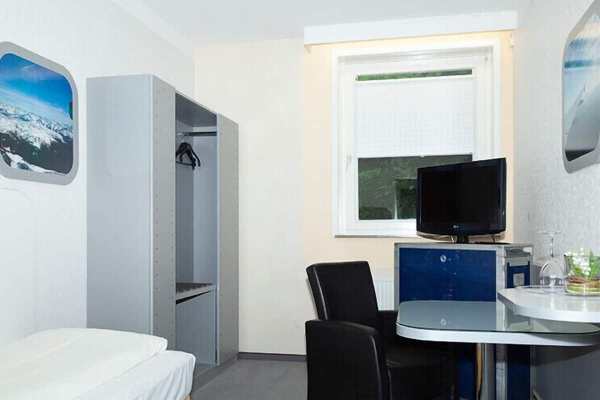 single room | living area | tv