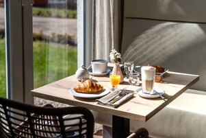 Daily buffet breakfast (EUR 19.5 per person)
