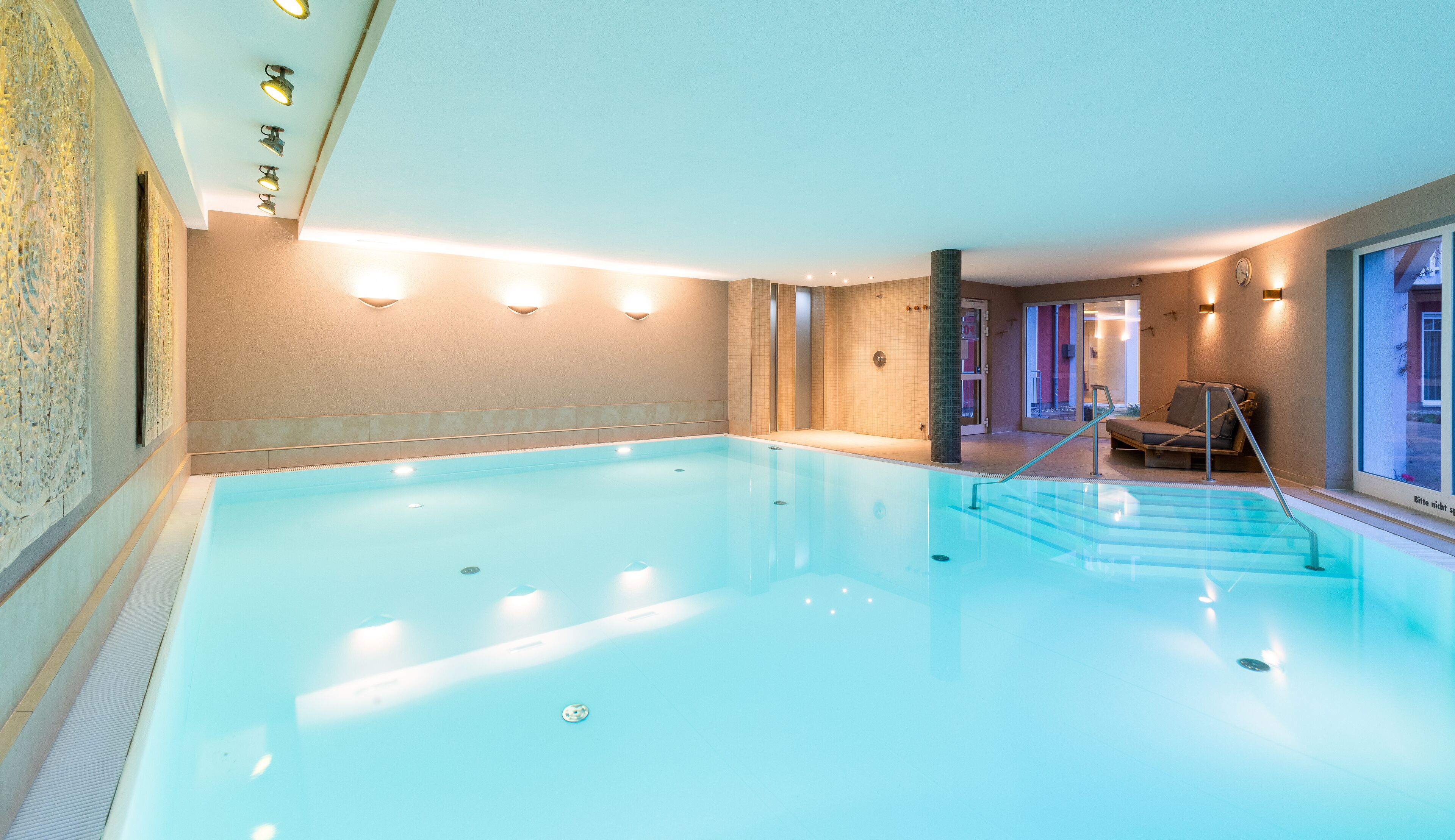 indoor pool, open 7:00 am to 9:00 pm, pool loungers