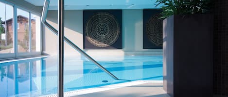 Indoor pool, open 7:00 AM to 9:00 PM, sun loungers