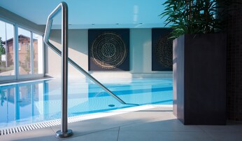 Indoor pool, open 7:00 AM to 9:00 PM, sun loungers