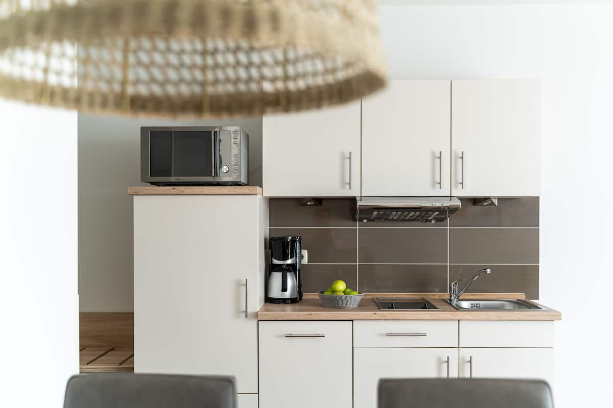 apartment, 1 bedroom, balcony | minibar, in-room safe, free wifi