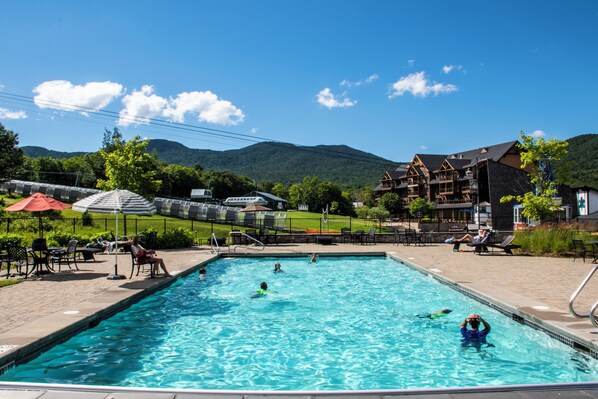Seasonal outdoor pool, open noon to 4:00 PM, lifeguards on site