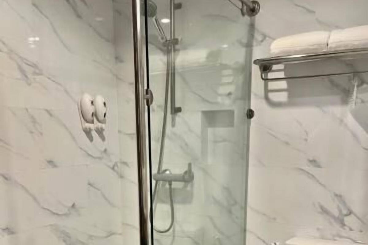 Bathroom | Hair dryer, towels, soap, shampoo