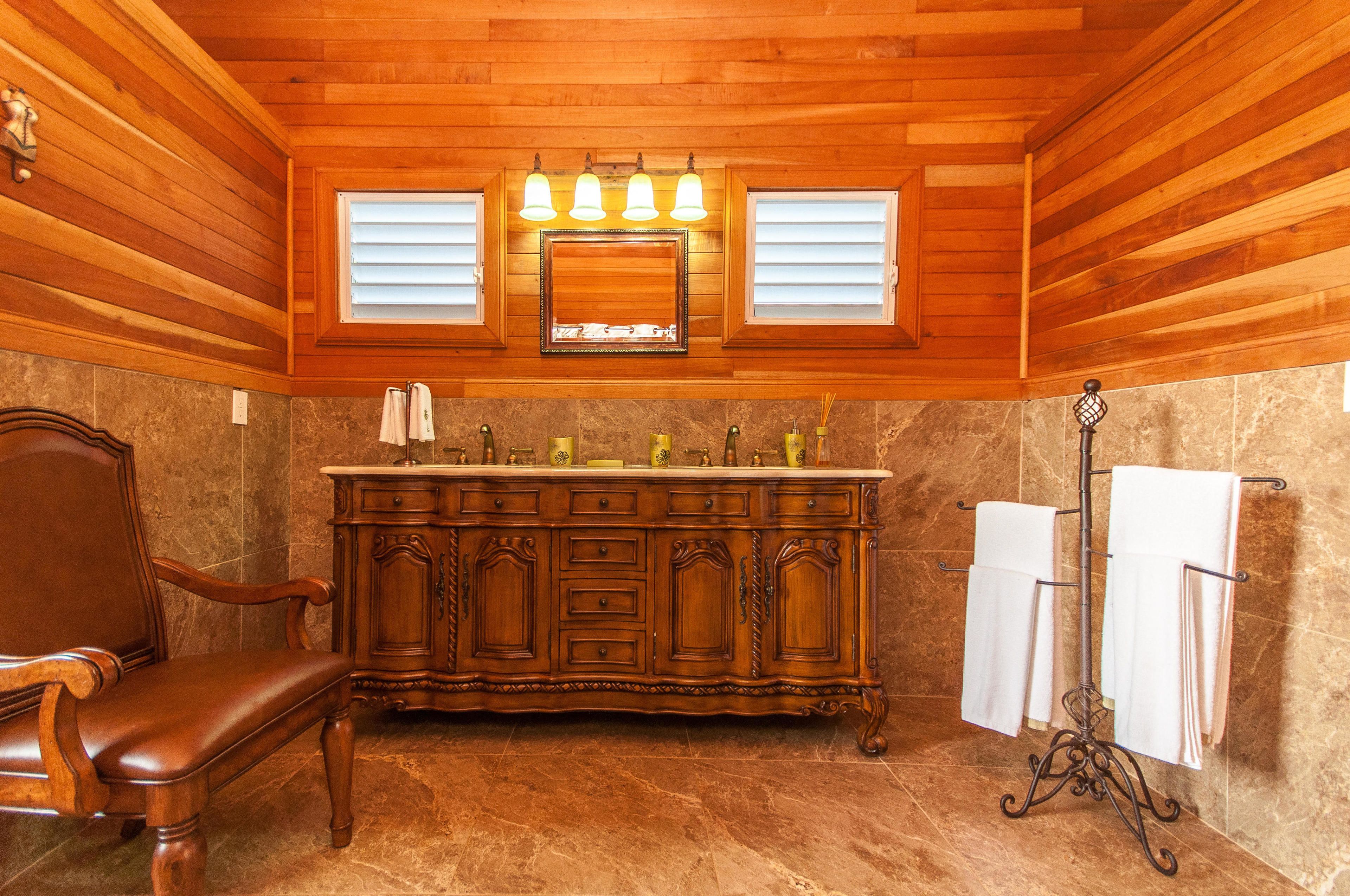 owner suite - river view | bathroom | rainfall showerhead, free toiletries, hair dryer, towels